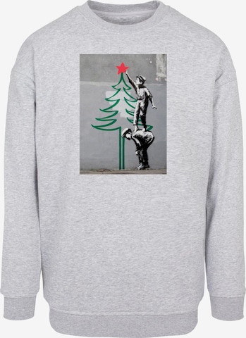 Sweat-shirt 'Banksy - Christmas Tree' Merchcode en gris : devant