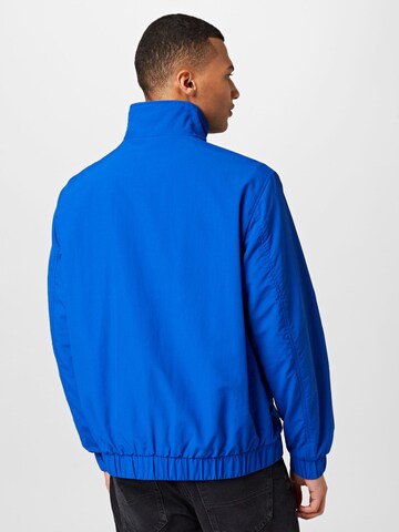 Tommy Jeans Overgangsjakke i blå