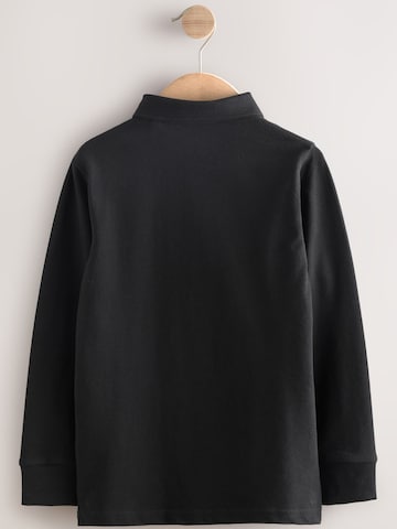 Tricou de la Next pe negru