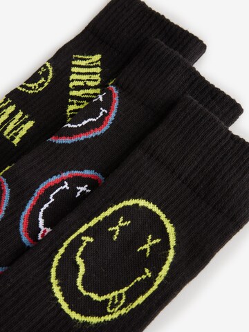 Next - Calcetines 'Nirvana' en negro