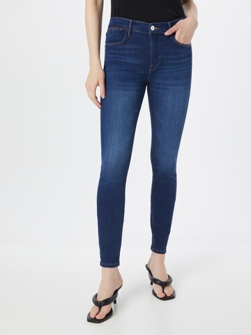 FRAME Skinny Jeans in Blue: front