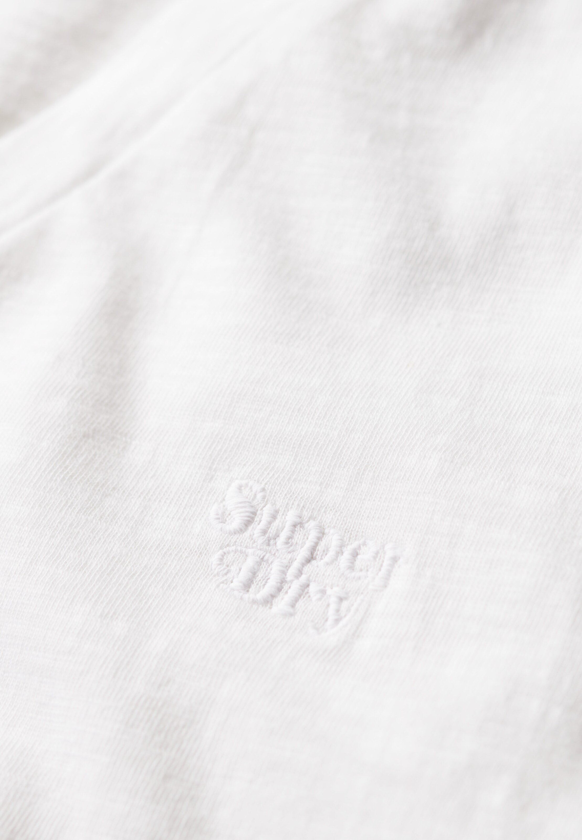 Superdry - Camiseta 'Studios' en blanco