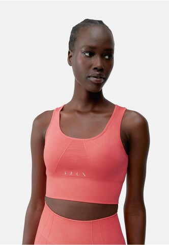 Born Living Yoga Sporttop 'Urdhva' in Roze: voorkant