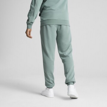 Effilé Pantalon de sport PUMA en vert