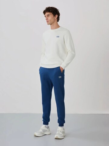Tommy Life Sweat suit in Blue: front