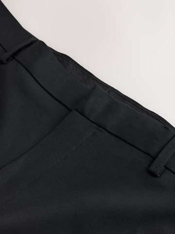 Next Regular Trousers with creases 'Motionflex' in Black
