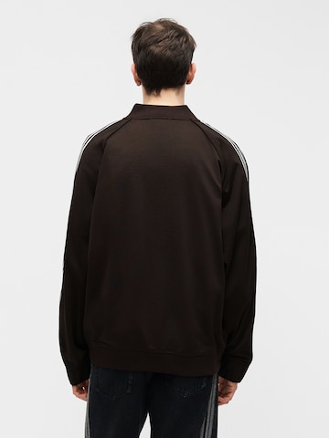 ADIDAS ORIGINALS Демисезонная куртка 'BRITCORE' в Коричневый
