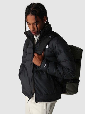 THE NORTH FACE Дорожная сумка в Зеленый