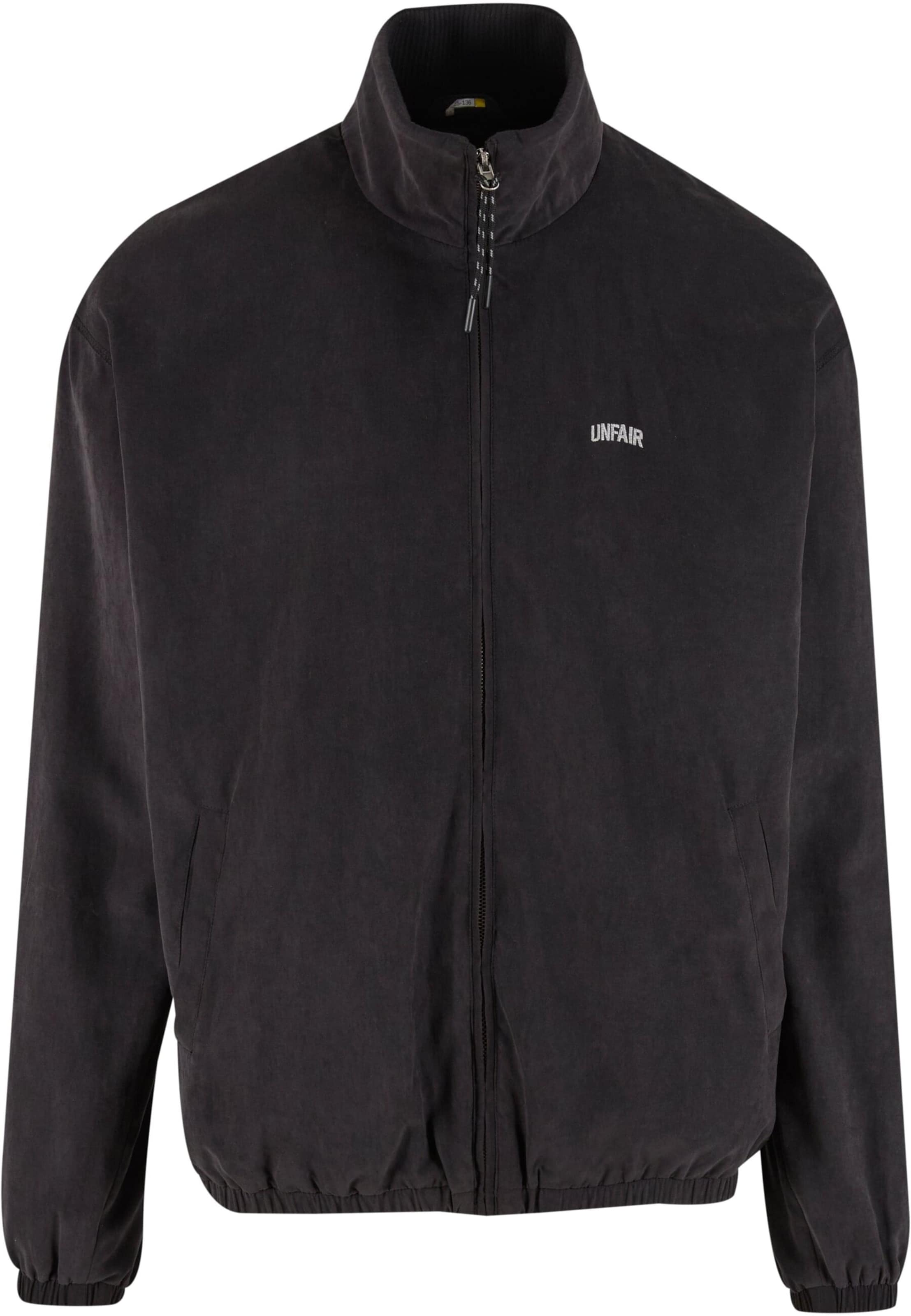 Unfair Athletics Between-season jacket in Black: front