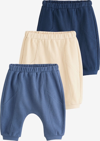 Next Tapered Housut värissä beige: etupuoli