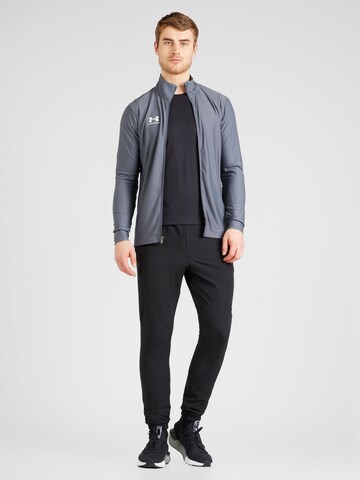 UNDER ARMOUR Tapered Sportbroek in Zwart