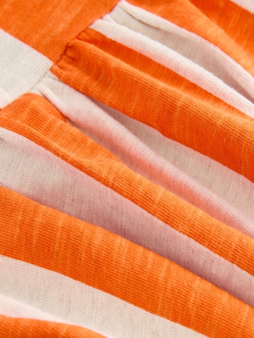 Robe Next en orange