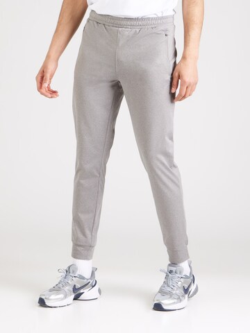 Tapered Pantaloni sportivi 'FNK' di 4F in grigio: frontale