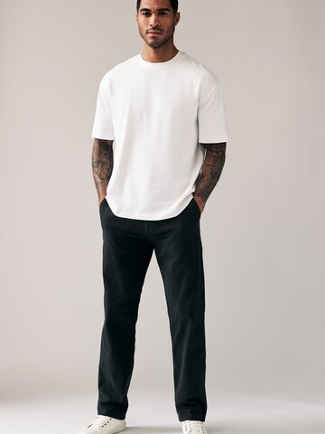Loosefit Pantaloni chino di Next in nero