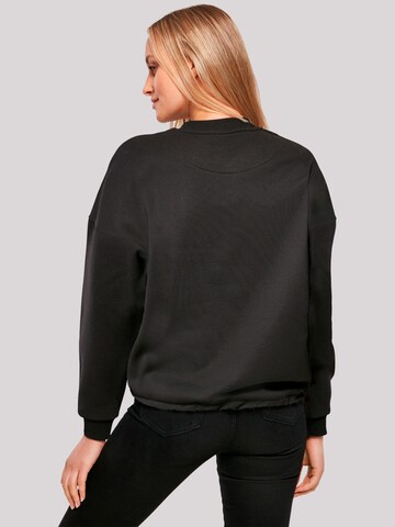Sweat-shirt 'I Believe UFO Alien Sonnenuntergang' F4NT4STIC en noir
