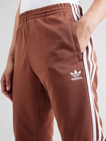 Effilé Pantalon 'Adicolor Classics Sst' ADIDAS ORIGINALS en marron