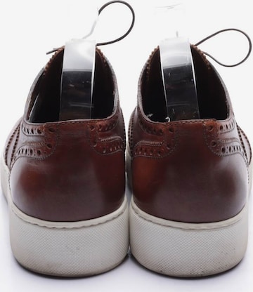 Louis Vuitton Flats & Loafers in 40,5 in Brown