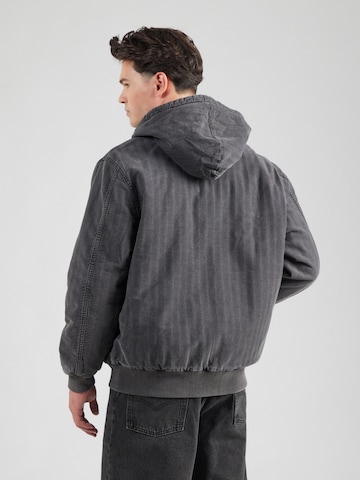 LEVI'S ® Between-season jacket 'Potrero Denim Hoodie' in Black