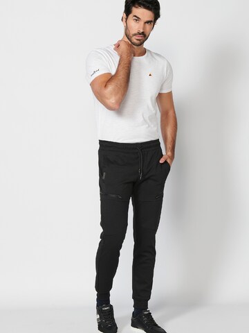 KOROSHI - Tapered Pantalón en negro