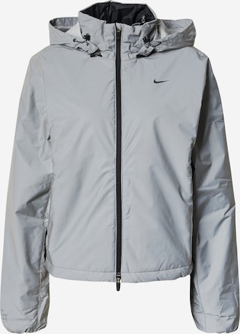 Nike SportswearPrijelazna jakna 'DVN' - siva boja: prednji dio