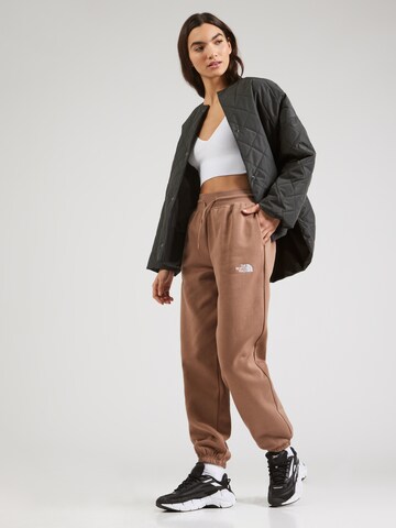 THE NORTH FACE - Tapered Pantalón 'ESSENTIAL' en marrón