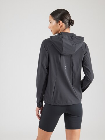 Giacca sportiva 'SWIFT' di NIKE in nero