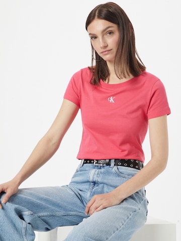 rožinė Calvin Klein Jeans Marškinėliai: priekis