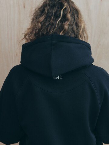 Sweat-shirt self. en noir