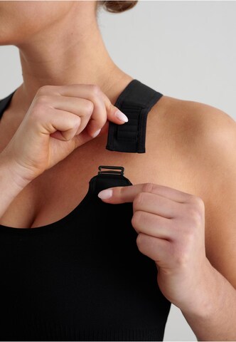 Bustino Reggiseno sportivo di Aim'n in nero