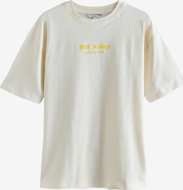 Tricou de la Next pe galben: față