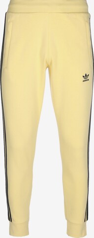 ADIDAS ORIGINALS Pants in Yellow: front