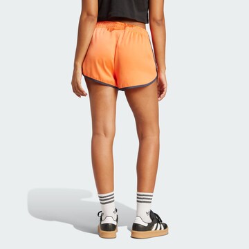 ADIDAS ORIGINALS Loosefit Nadrág 'Sprinter' - narancs