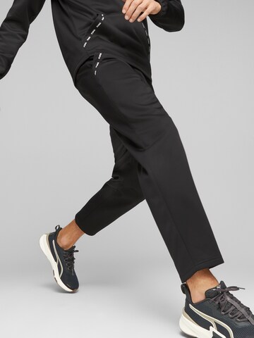 Regular Pantalon de sport PUMA en noir : devant