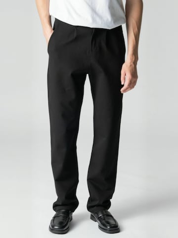 TEESHOPPEN - regular Pantalón ' Wide ' en negro