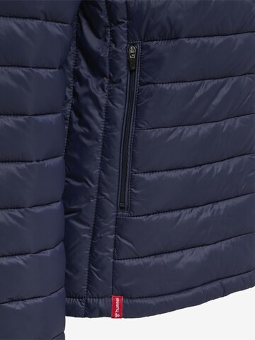 Veste d’hiver Hummel en bleu