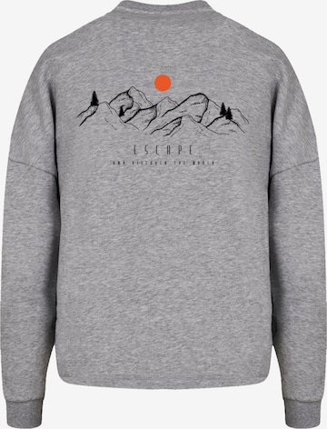 Sweat-shirt 'Discover the world' F4NT4STIC en gris