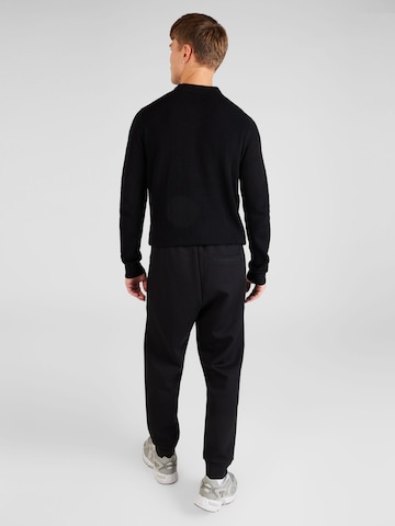 Tapered Pantaloni 'Hadiko1' di BOSS in nero