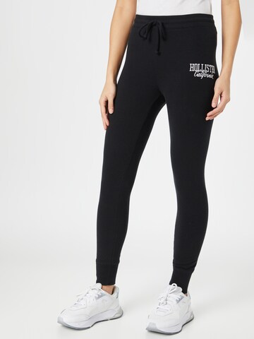 HOLLISTER Skinny Pants in Black: front