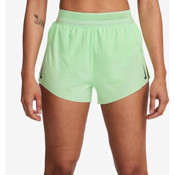 NIKE Regular Workout Pants in Green: front