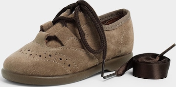 Scarpa bassa di Pisamonas in grigio: frontale