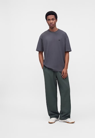 ADIDAS ORIGINALSLoosefit Hlače 'TEAMGEIST' - siva boja