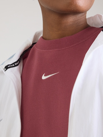 Nike Sportswear - Sudadera 'Studio' en rosa