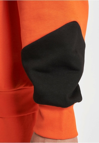 Bluză de molton 'Ecko Unltd. Construction' de la Ecko Unlimited pe portocaliu