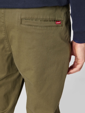 LEVI'S ® Tapered Chino Pants 'XX Chino Jogger III' in Green