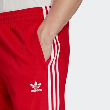 Effilé Pantalon 'Adicolor Classics Cutline' ADIDAS ORIGINALS en rouge