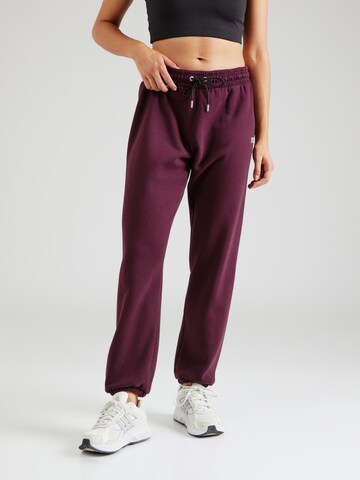 Effilé Pantalon de sport DKNY Performance en violet : devant