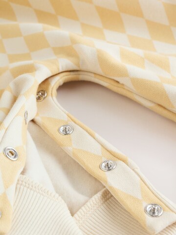 Next Strampler in Gelb