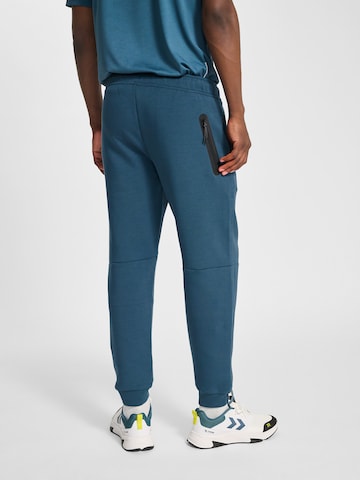 Hummel Tapered Sportbroek 'Tech Fleece' in Blauw