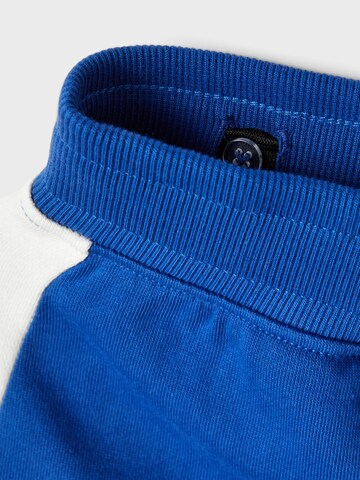 NAME IT Zwężany krój Spodnie 'Boman' w kolorze niebieski