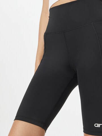 Coupe slim Pantalon de sport aim'n en noir